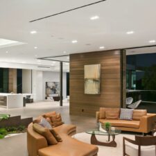 An open-concept living area with in-ceiling speakers.